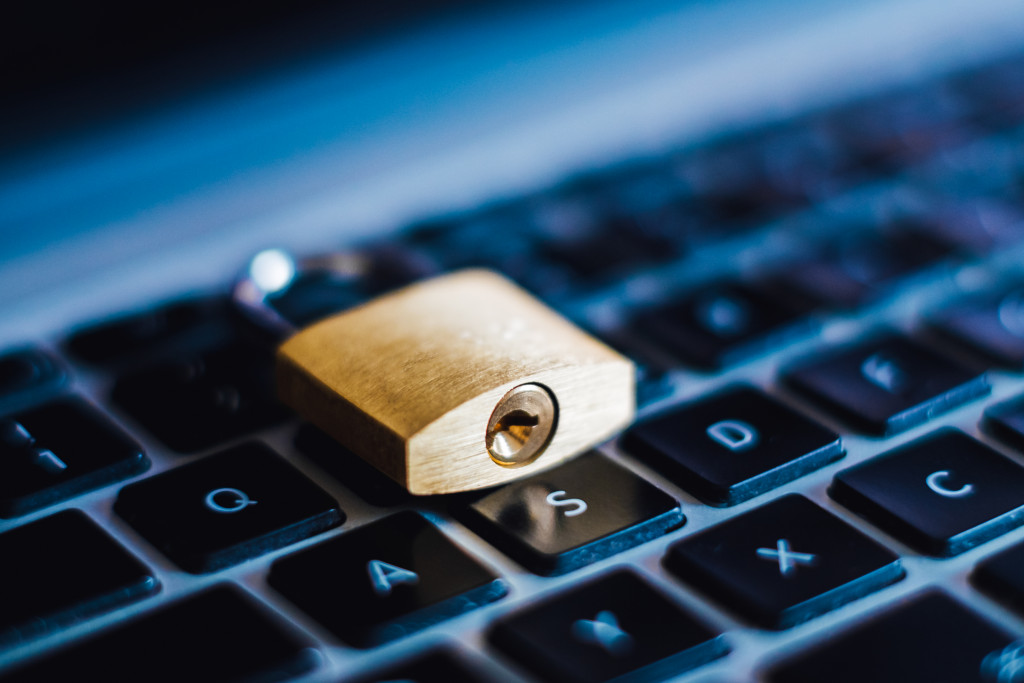 A padlock on a laptop keyboard