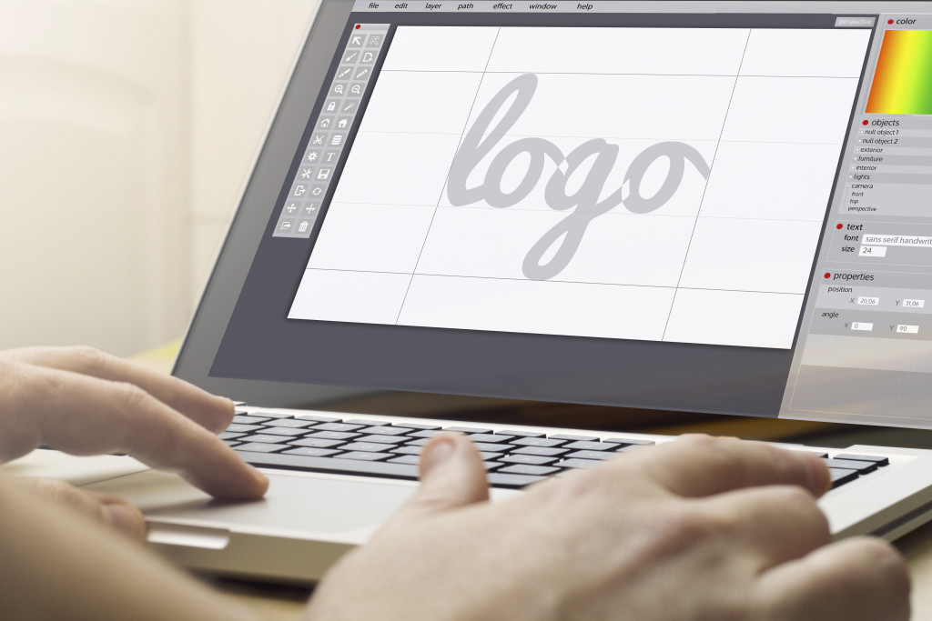 designing business logo in a laptop